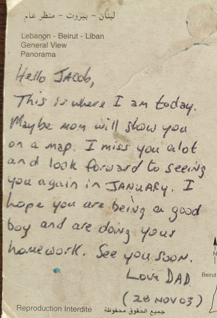 The handwritten message: Hello Jacob — this is where I am today. Maybe mom will show you on a map. I miss you a lot and look forward to seeing you again in January. I hope you are being a good boy and are doing your homework. See you soon. Love Dad — 28 Nov 03